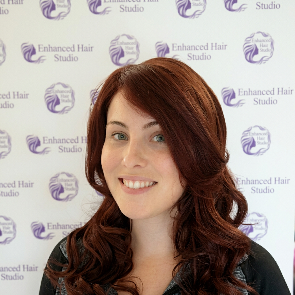 Enhanced Hair Studio client wearing her fitted integration system